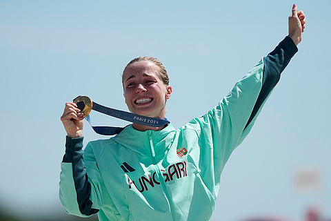 Women's Modern Pentathlon: Hungary's Blanka Guzi celebrates winning gold